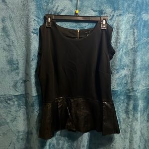 Sleeveless ruffled hem blouse